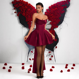 Burgundy strapless draped mini dress with sweetheart neckline and flared skirt